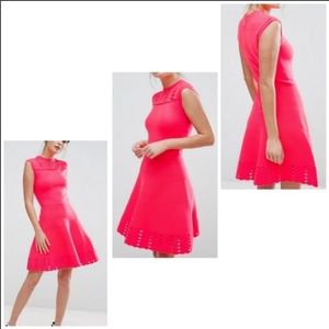 New with tags Ted Baker Skater Dress. Coral color size 1.